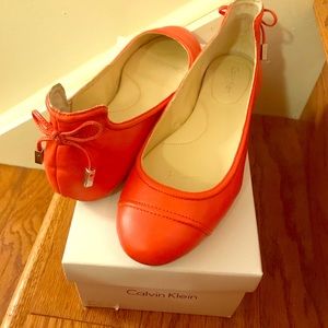 Calvin Klein orange flats with bow